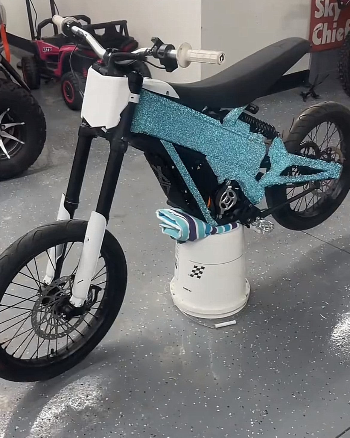 Customer's e-moto wrapped in light blue Diamond Glitter Wrap